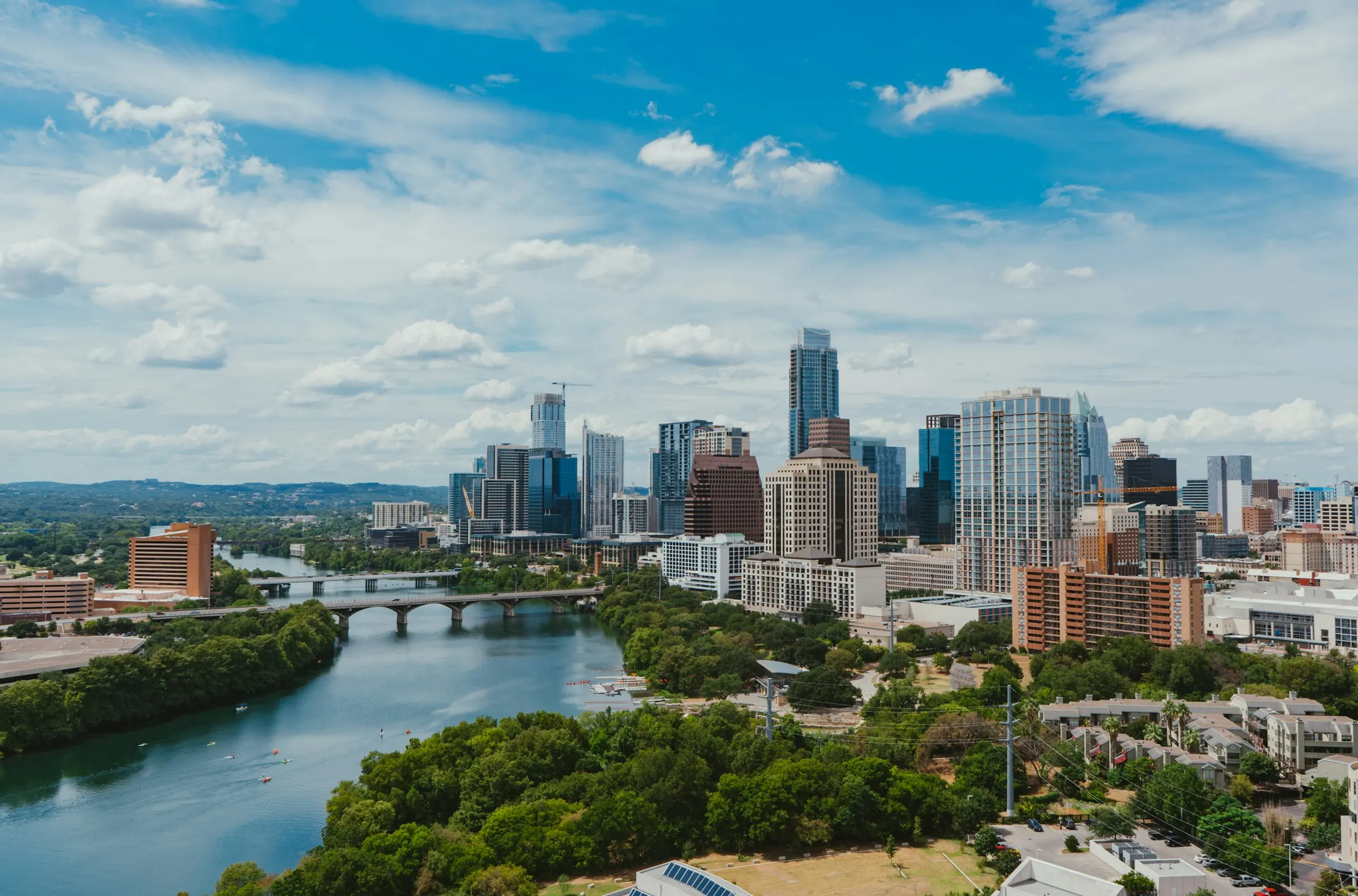 Austin, Texas downtown skyline photographed across Lady Bird Lake, the headquarters market for TheKabza.com