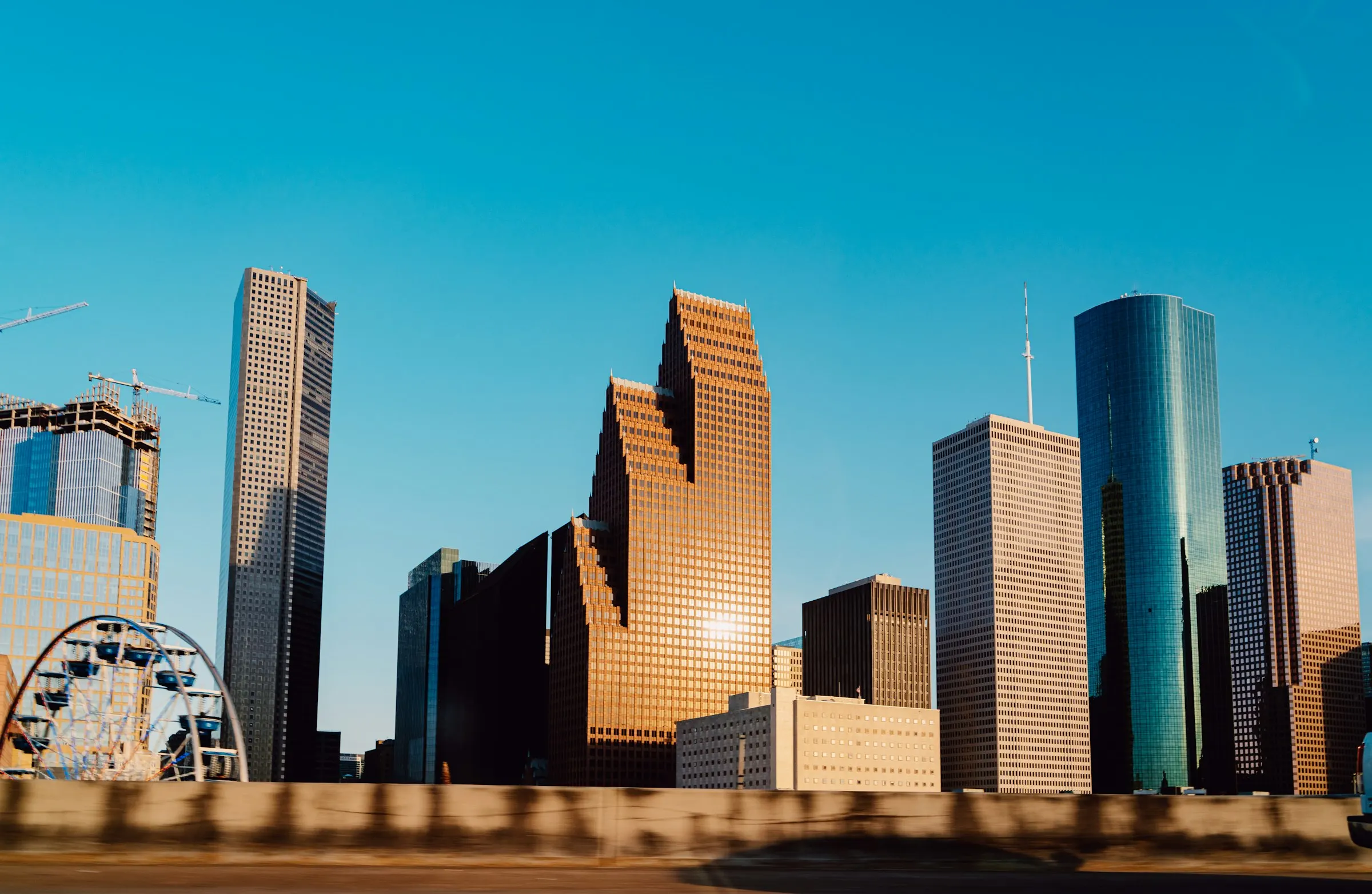 Houston, Texas downtown skyline photographed at golden hour across the Houston metro housing market