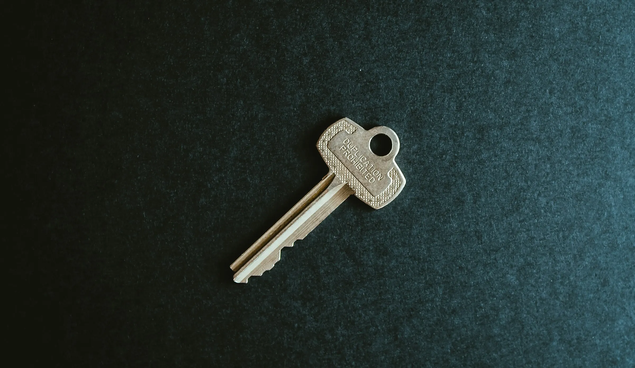 House keys being handed to new home buyers at closing, the moment of possession
